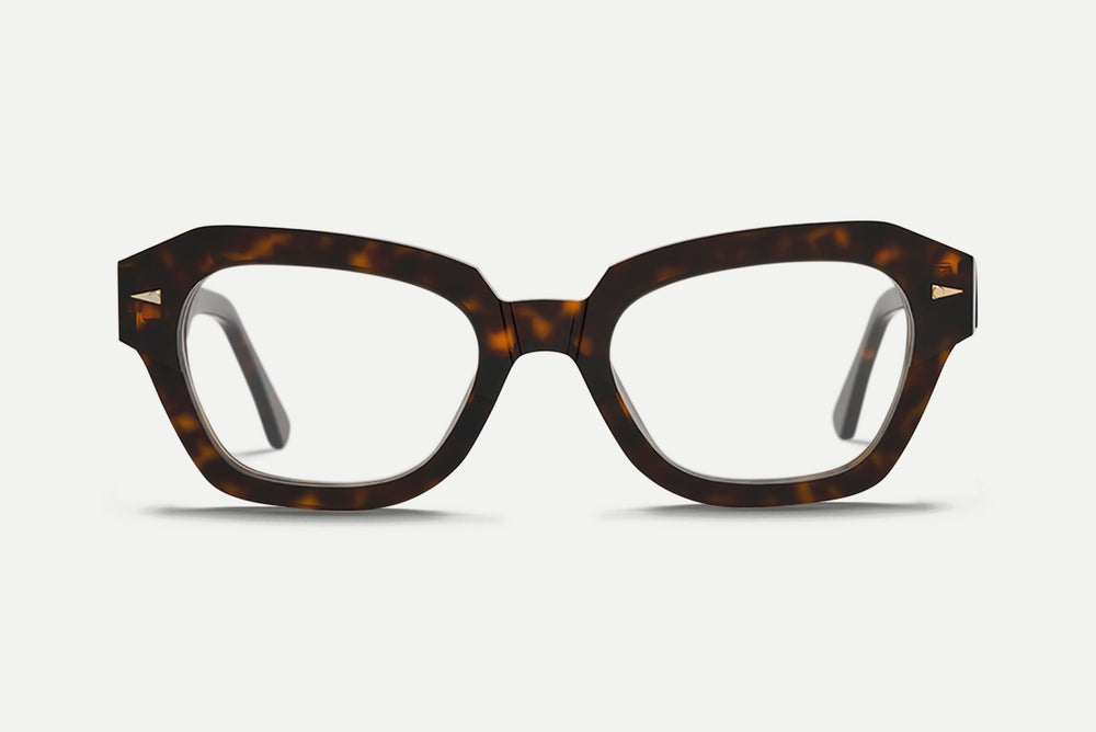 Front view of thick geometric style Havana pattern eyeglasses frame